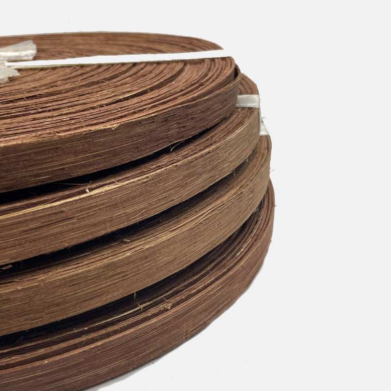 Brown flat pith ribbon 14 mm. 500gr coil.