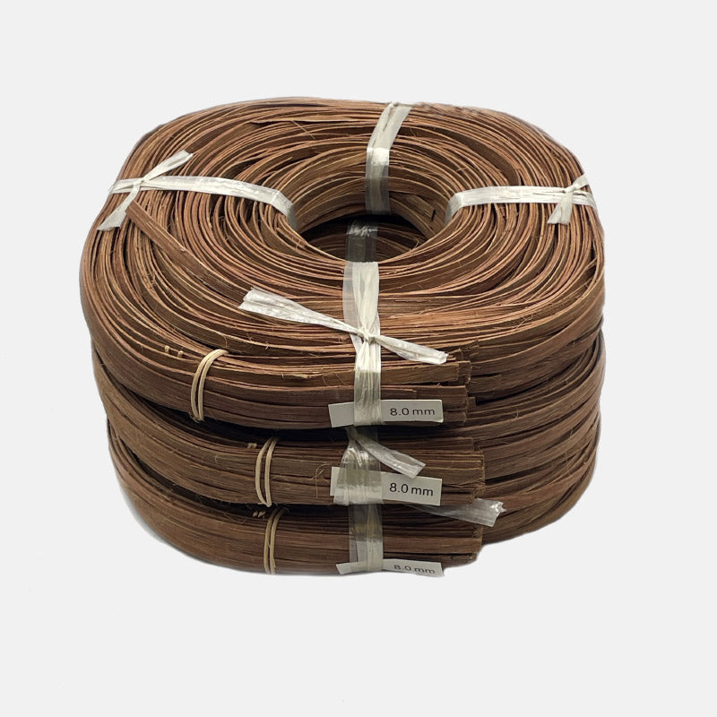 Brown flat pith ribbon 8 mm. 500gr coil.