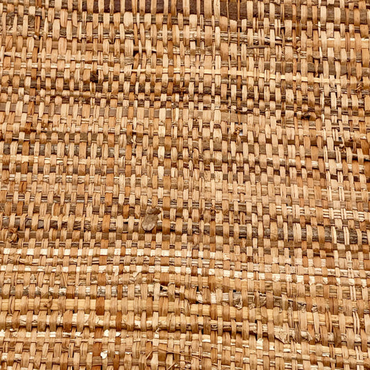 Linear meter of burgundy raffia fabric and natural banana fiber, 90 cm wide.